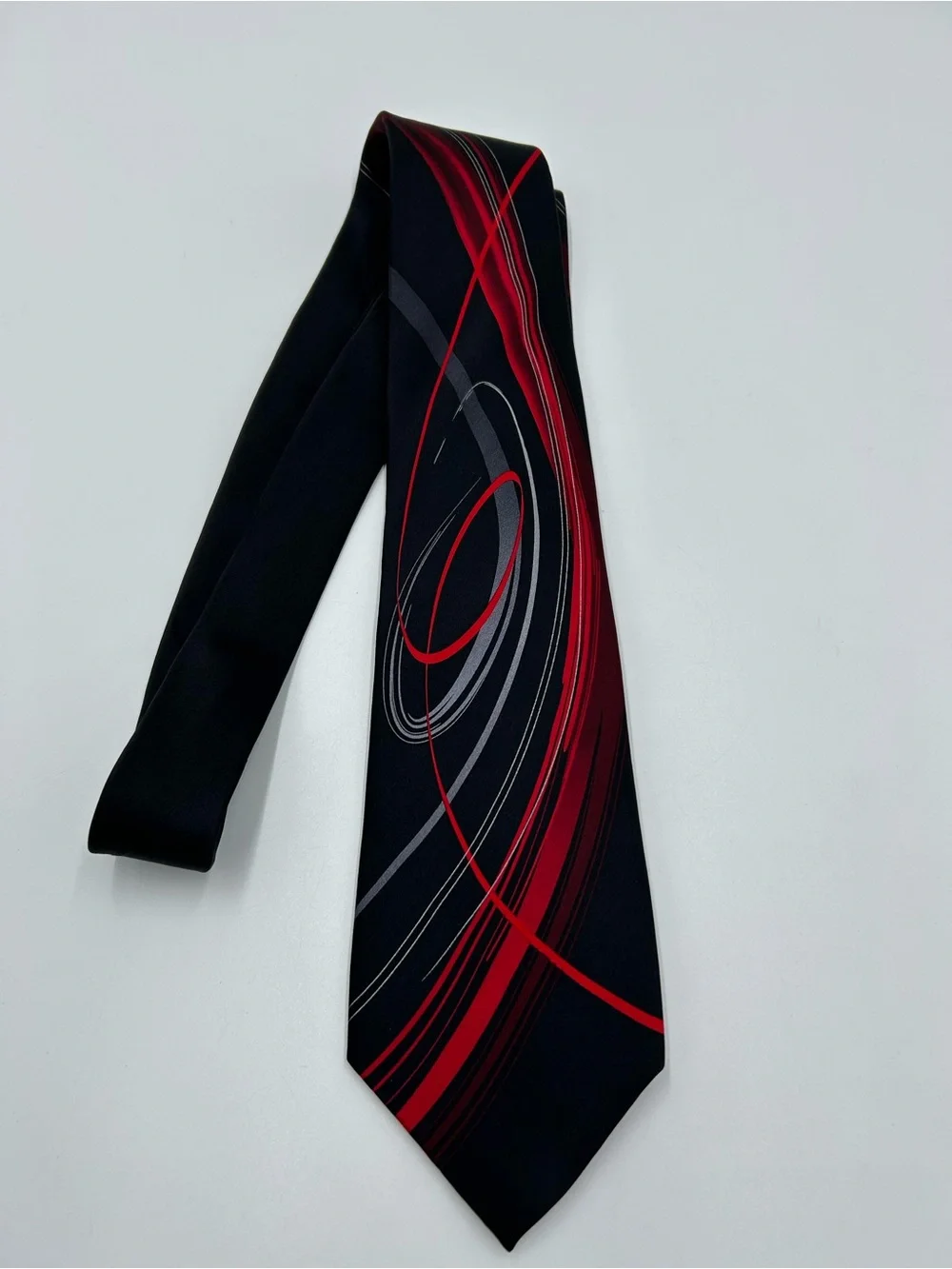 J. Garcia Abstract Silk Black Tie with Red and Gray Swirl Accent